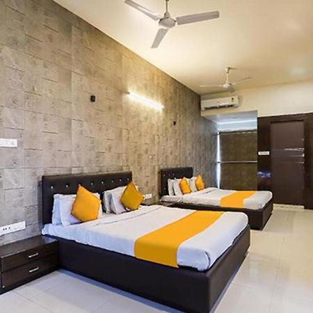 โอโย 71730 โฮเต็ล แมริโกลด์ Hotel สุรัต ภายนอก รูปภาพ