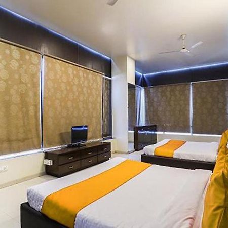 โอโย 71730 โฮเต็ล แมริโกลด์ Hotel สุรัต ภายนอก รูปภาพ
